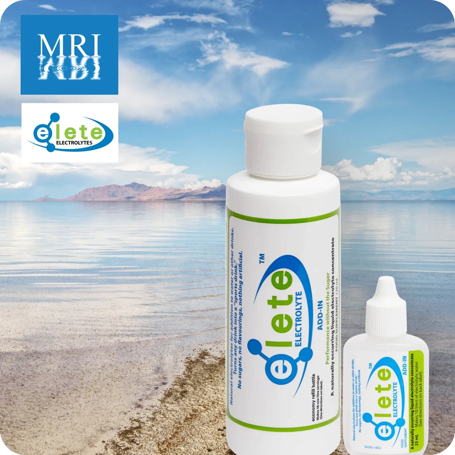 elete electrolyte concentrate bottles by a natural lake with blue sky and mountains