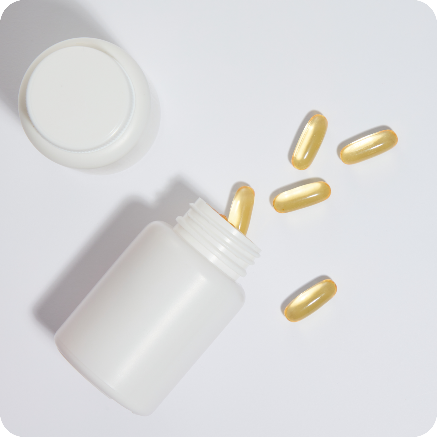 Open white bottle with clear yellow capsules for natural electrolyte supplement